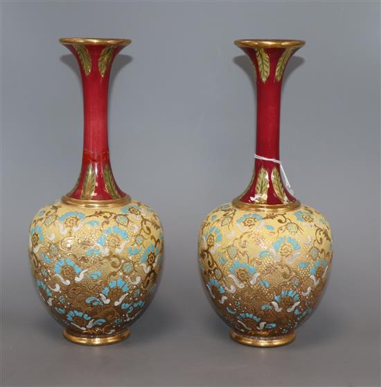 A pair of Royal Doulton vases height 27cm